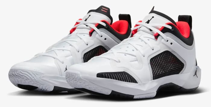 View of white, lack, and red Air Jordan shoes.